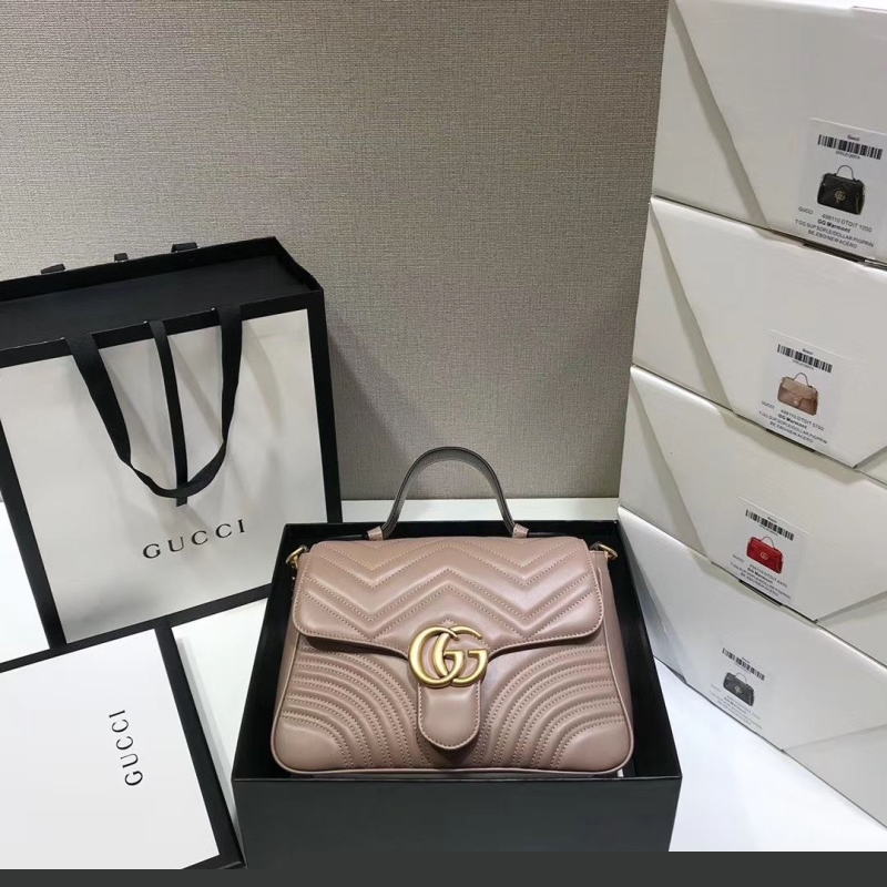 G*u*i top handle bags